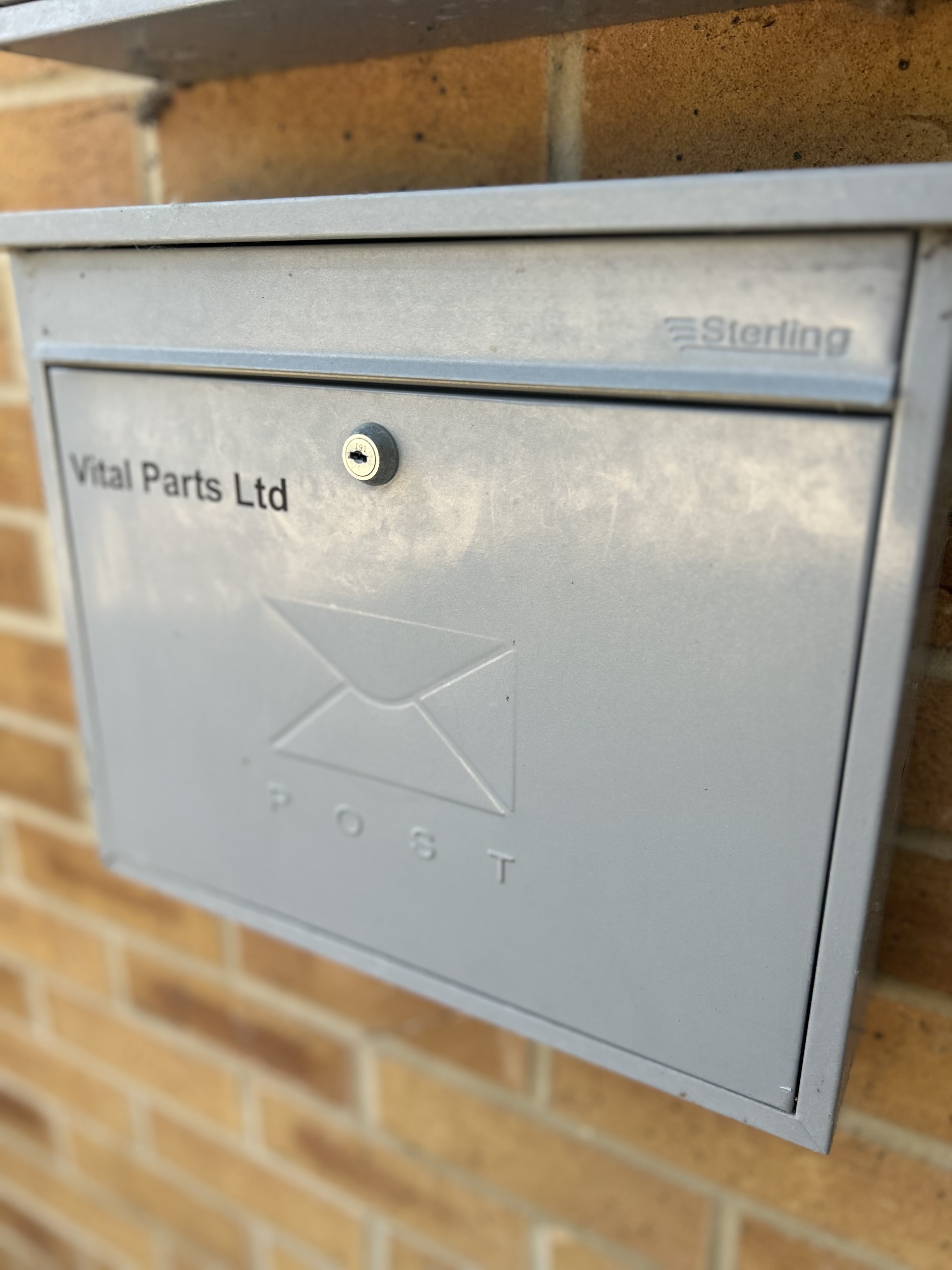 Wall mounted postal box